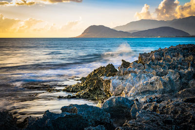 Scenic view of sea against sky during sunset