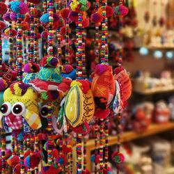 Multi colored decorations for sale in market stall