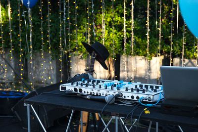 Close-up of sound mixer at party outdoors