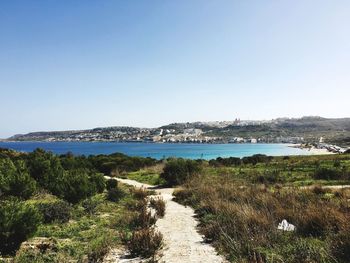 Scenic view of calm sea against clear sky