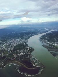 Aerial view of cityscape against sky