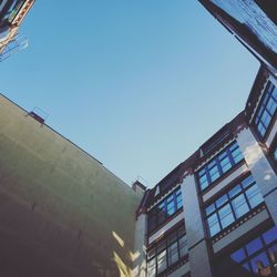 Low angle view of building against blue sky