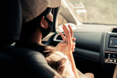 Portrait of man driving car