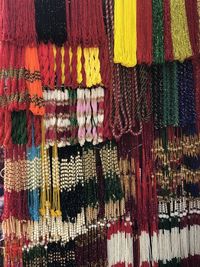 Full frame shot of necklaces for sale at market