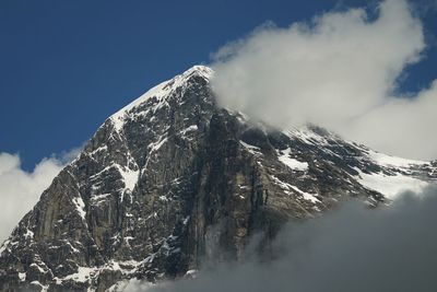 Scenic view of snowcapped mountain against sky