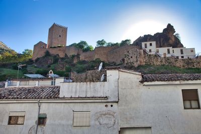 Low angle view of old buildings against sky