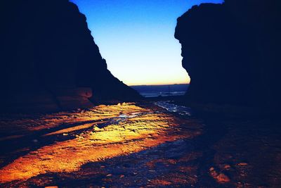 Scenic view of silhouette landscape against sky during sunset