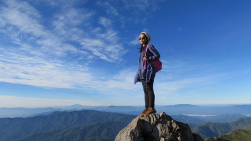 Woman on mounain peak