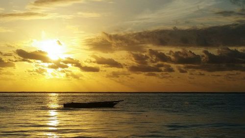 Scenic view of sea against dramatic sky