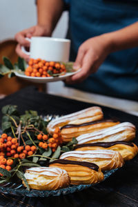 Midsection of person preparing food on table