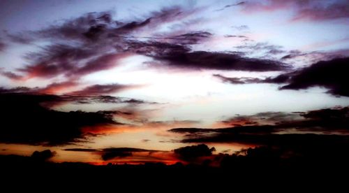 Low angle view of dramatic sky during sunset