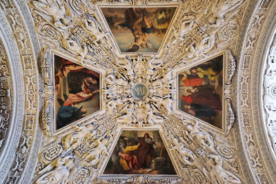 Low angle view of ornate ceiling of building