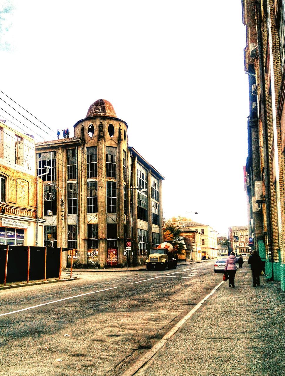 architecture, built structure, building exterior, clear sky, outdoors, day, city, road, sky, no people