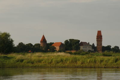 River by building against sky