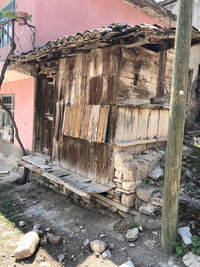 Old abandoned house by building