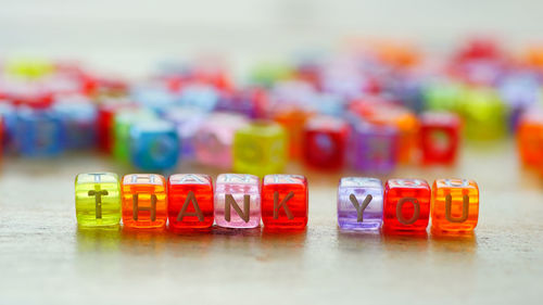 Close-up of multi colored objects on table