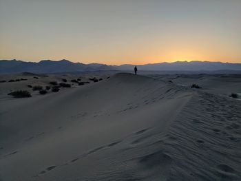 Scenic view of desert against clear sky