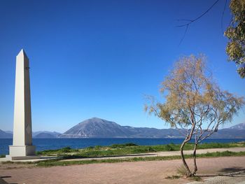 Scenic view of landscape against clear blue sky