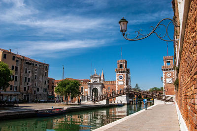 View of the venetian arsenale against sky in city