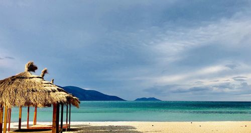 Scenic view of beach against sky