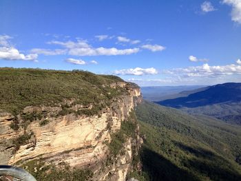 High angle view of blue mountains against sky