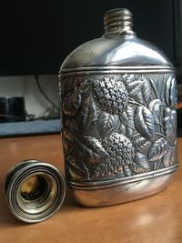 Close-up of glass jar on table