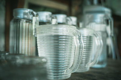 Close-up of glass jar on table