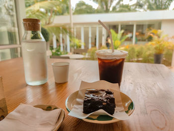 Close-up of coffee served on table