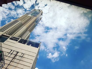 Low angle view of skyscraper against sky