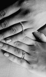 Cropped hands of couple