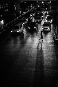 High angle view of vehicles on road at night