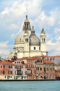 Grand canal by santa maria della salute against sky