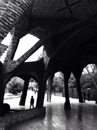 Rear view of people walking in building