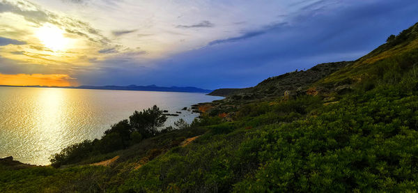 Scenic view of sea against sky during sunset