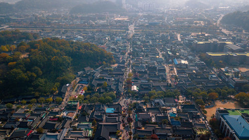 Aerial view of town against sky