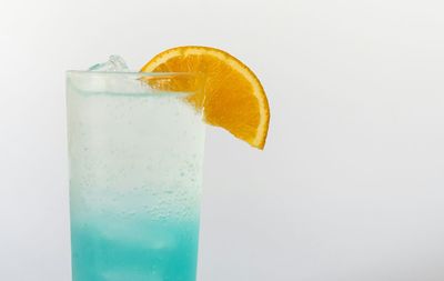 Close-up of drink against white background