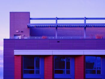 Low angle view of building against blue sky