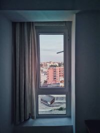 Buildings seen through window