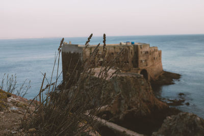 Scenic view of sea against clear sky