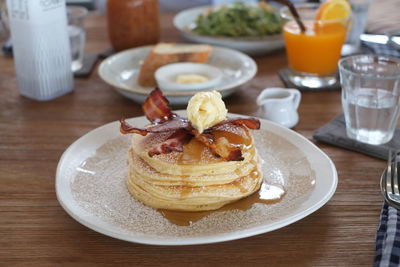 Close-up of breakfast served on table