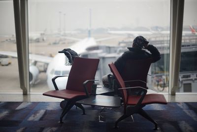 Empty chairs and tables in airport