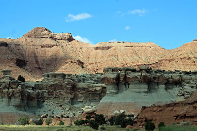 Rock formations against blue sky