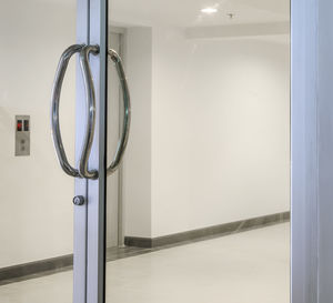 Modern building seen through open door