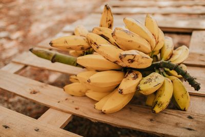 Close-up of bananas on wooden table