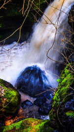 High angle view of waterfall in forest