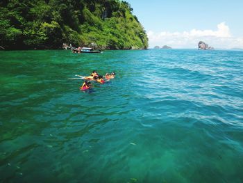 People enjoying in sea