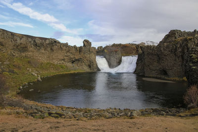 Aerial view of hjalparfoss waterfall in southwest iceland