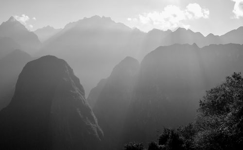 Idyllic shot of mountains during foggy weather