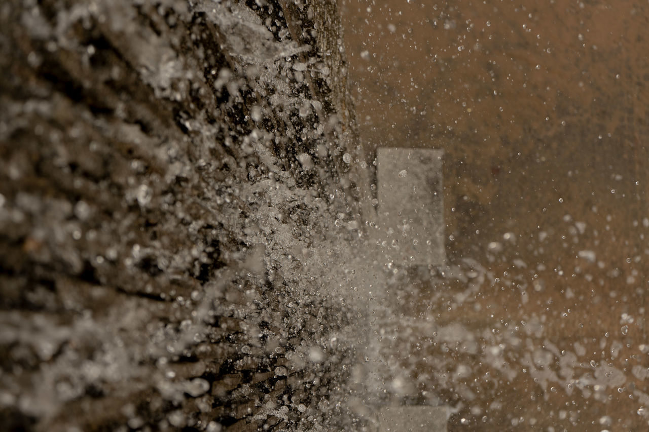 CLOSE-UP OF ICE ON WALL