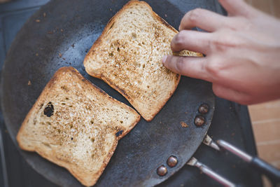 Close-up of person preparing food